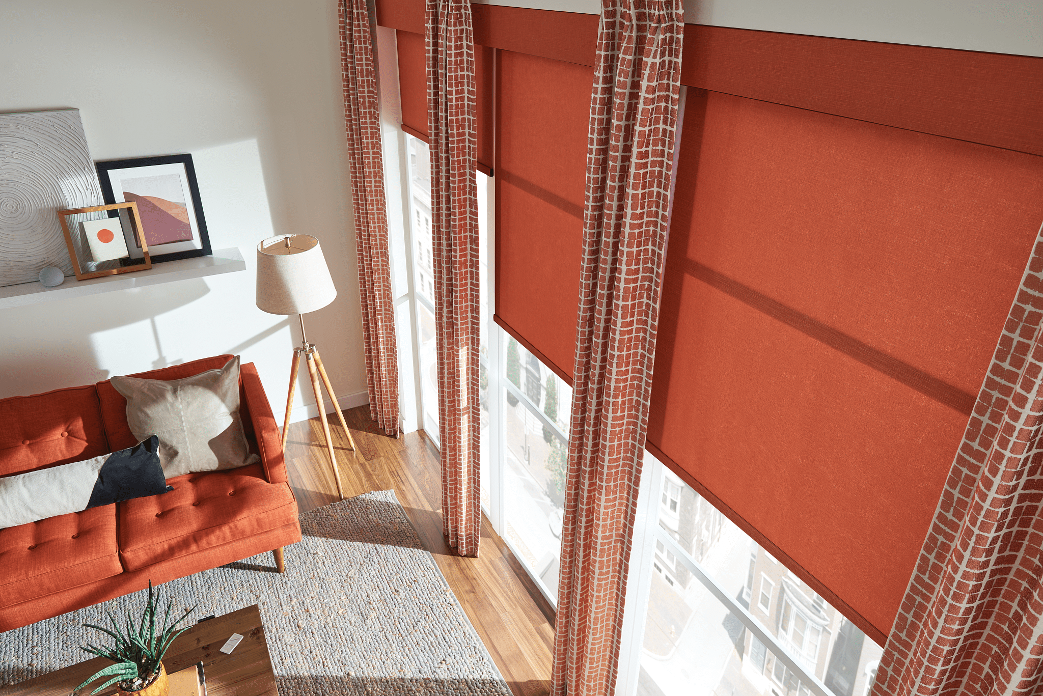 pleated drapery and roller shades